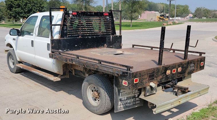 image for item LQ9253 2001  Ford F350 Super Duty  Crew cab flatbed pickup truck