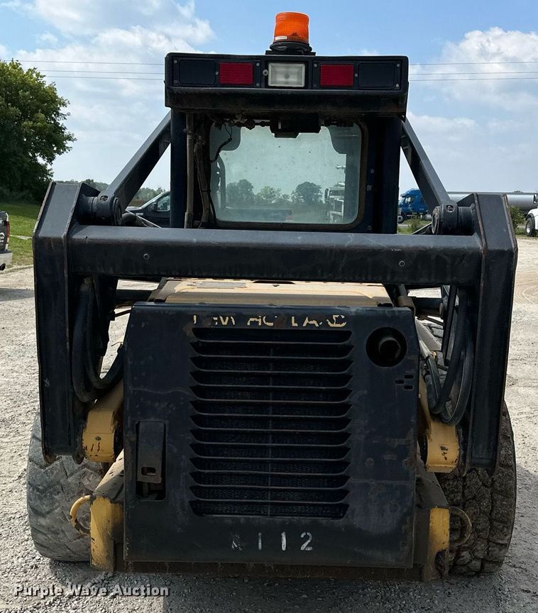 image for item MQ9356 1999 New Holland LX885  skid steer loader