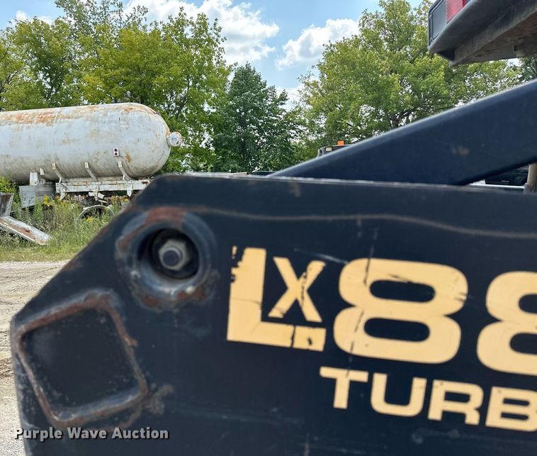 image for item MQ9356 1999 New Holland LX885  skid steer loader