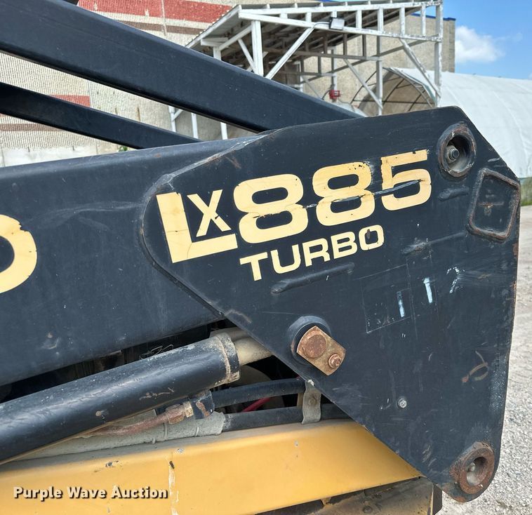 image for item MQ9356 1999 New Holland LX885  skid steer loader