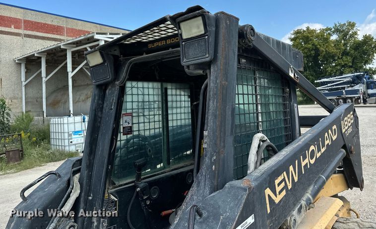 image for item MQ9356 1999 New Holland LX885  skid steer loader