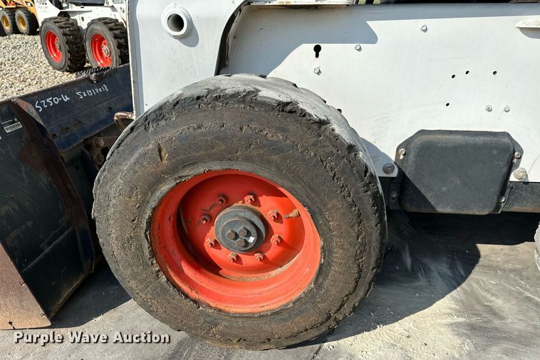 image for item NF9119 2002 Bobcat S250  skid steer loader