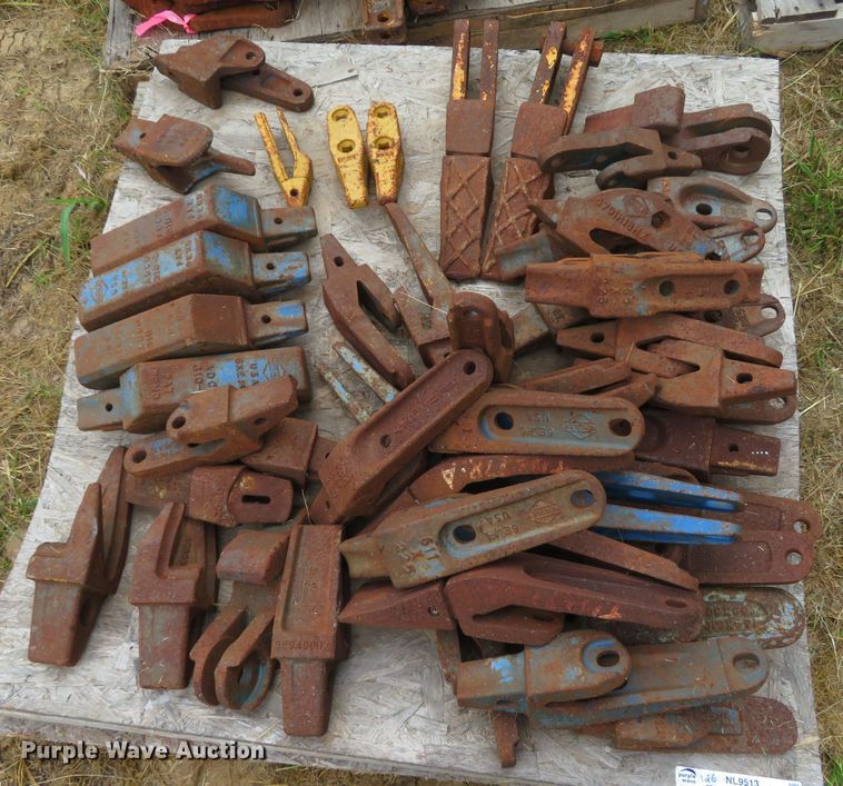 image for item NL9513 (6) pallets of excavator bucket teeth