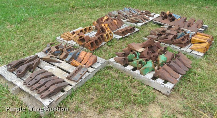 image for item NL9514 (7) pallets of excavator bucket teeth