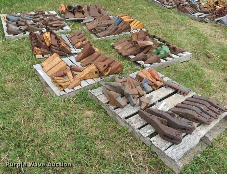 image for item NL9514 (7) pallets of excavator bucket teeth
