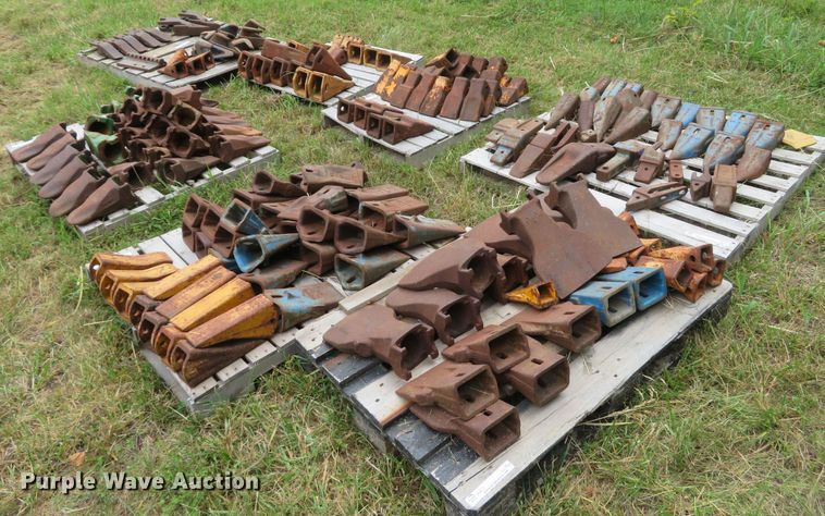 image for item NL9514 (7) pallets of excavator bucket teeth
