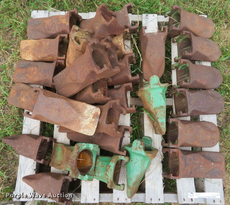 image for item NL9514 (7) pallets of excavator bucket teeth