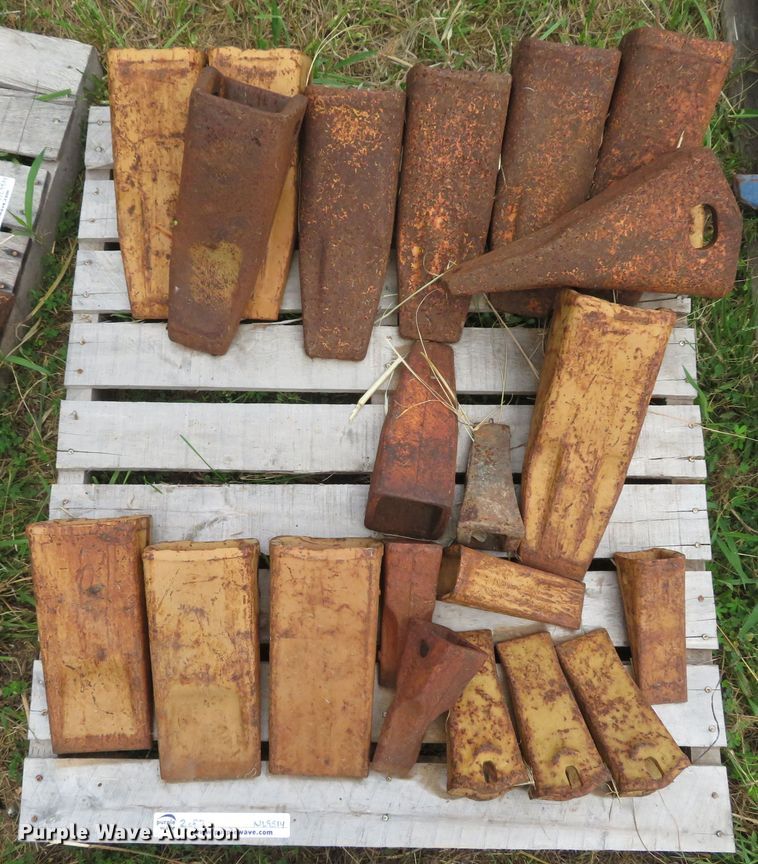 image for item NL9514 (7) pallets of excavator bucket teeth