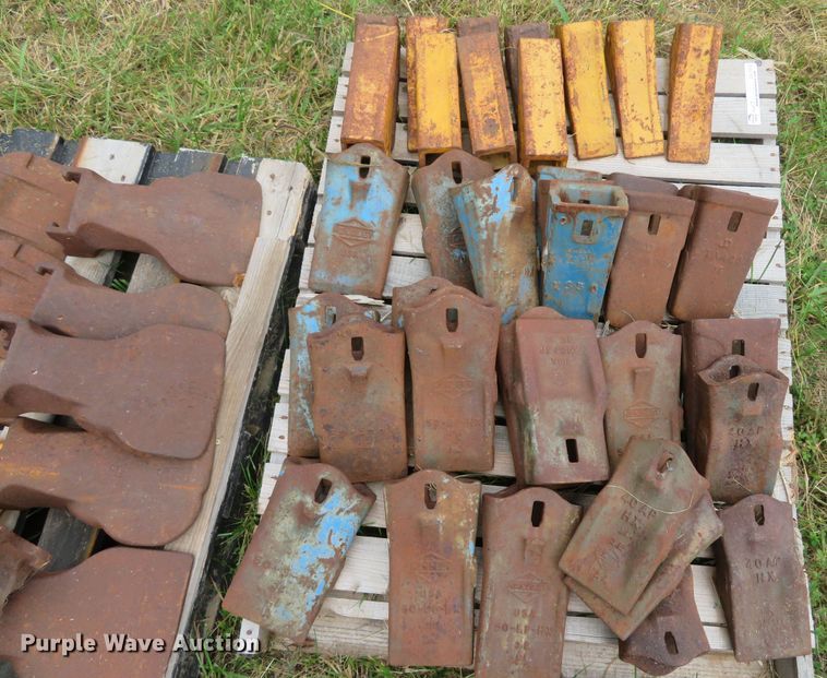 image for item NL9514 (7) pallets of excavator bucket teeth