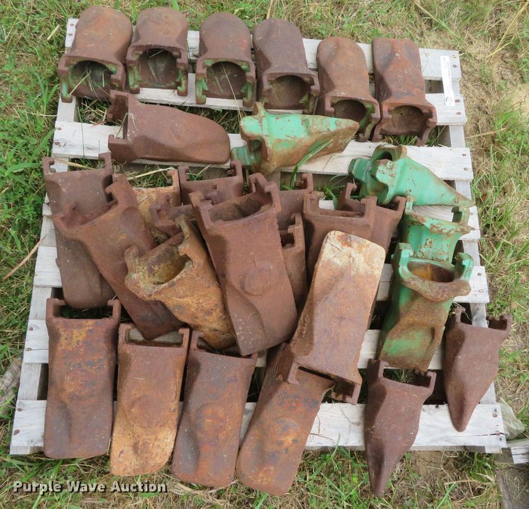 image for item NL9514 (7) pallets of excavator bucket teeth