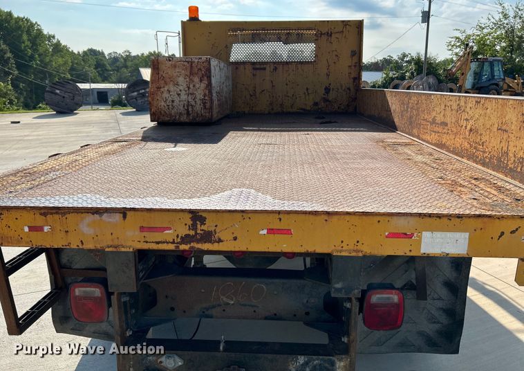 image for item NL9574 2000 GMC C6500  flatbed truck