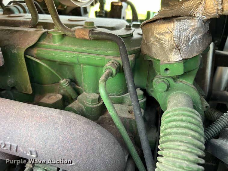 image for item DQ2191 2015 John Deere 6115M  MFWD tractor