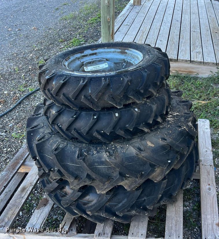 image for item NA9156 (4) BKT tires and wheels