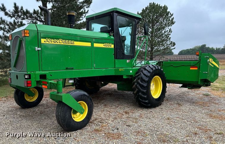 image for item NX9701 2004 John Deere 4895  swather / windrower
