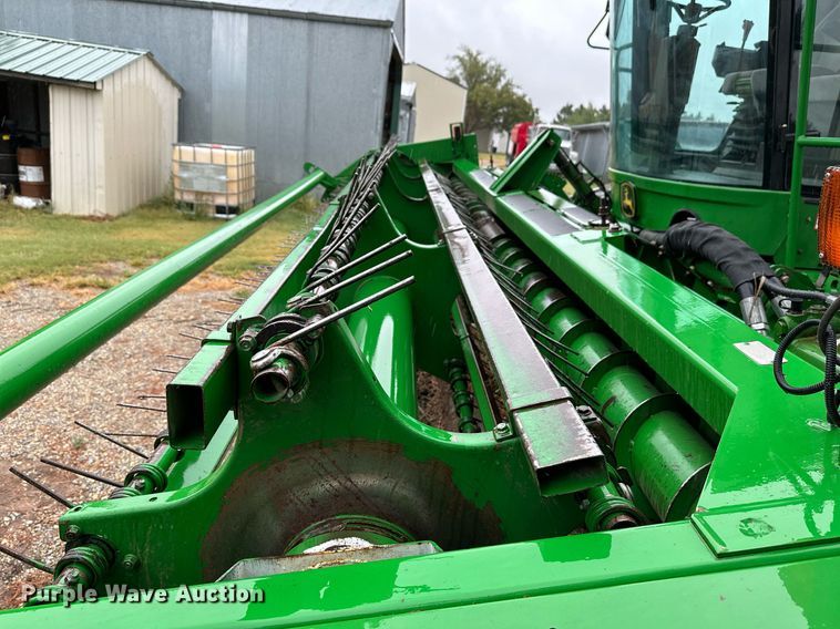 image for item NX9701 2004 John Deere 4895  swather / windrower