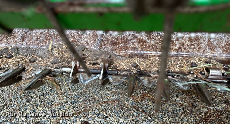 image for item NX9701 2004 John Deere 4895  swather / windrower