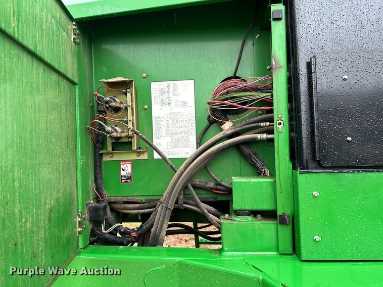 image for item NX9701 2004 John Deere 4895  swather / windrower