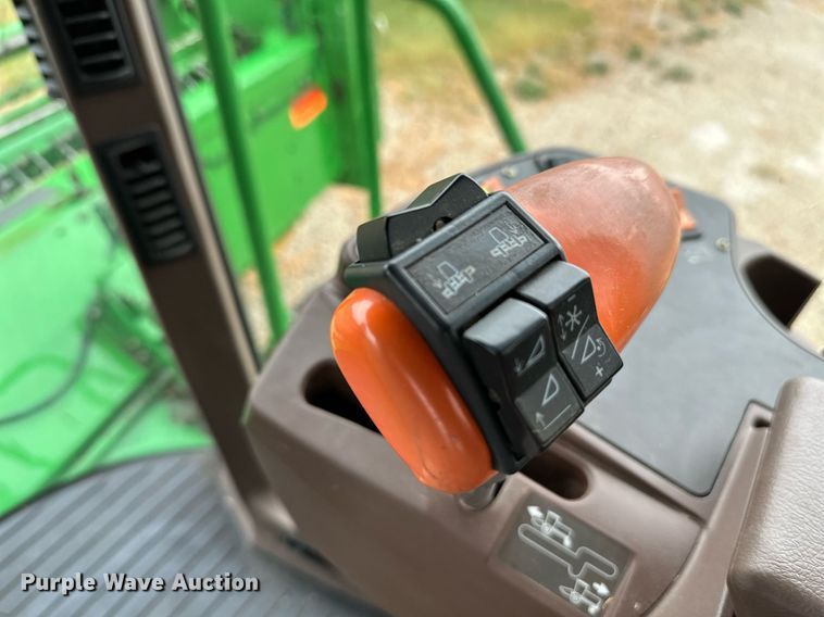 image for item NX9701 2004 John Deere 4895  swather / windrower