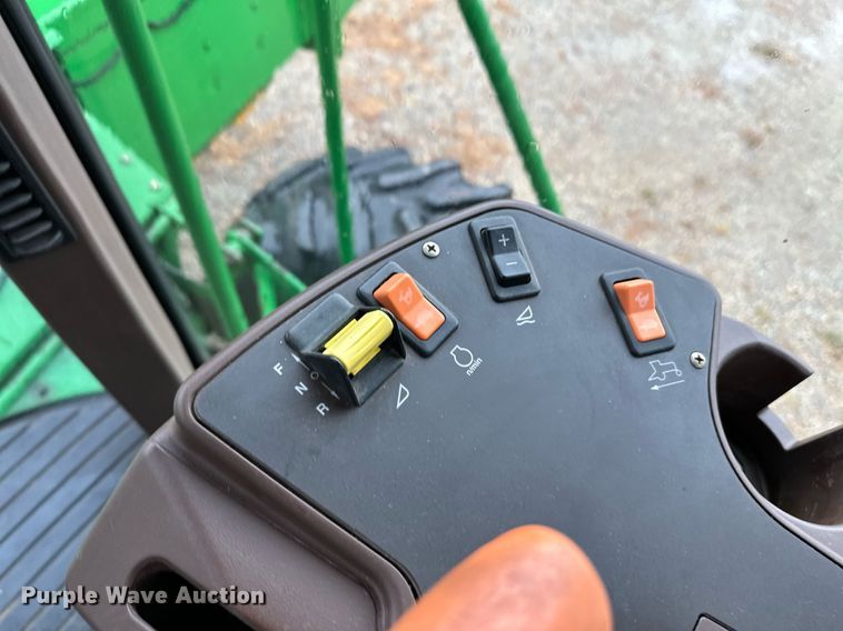 image for item NX9701 2004 John Deere 4895  swather / windrower