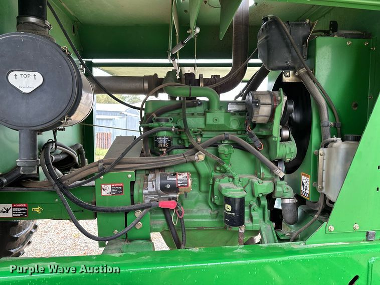 image for item NX9701 2004 John Deere 4895  swather / windrower