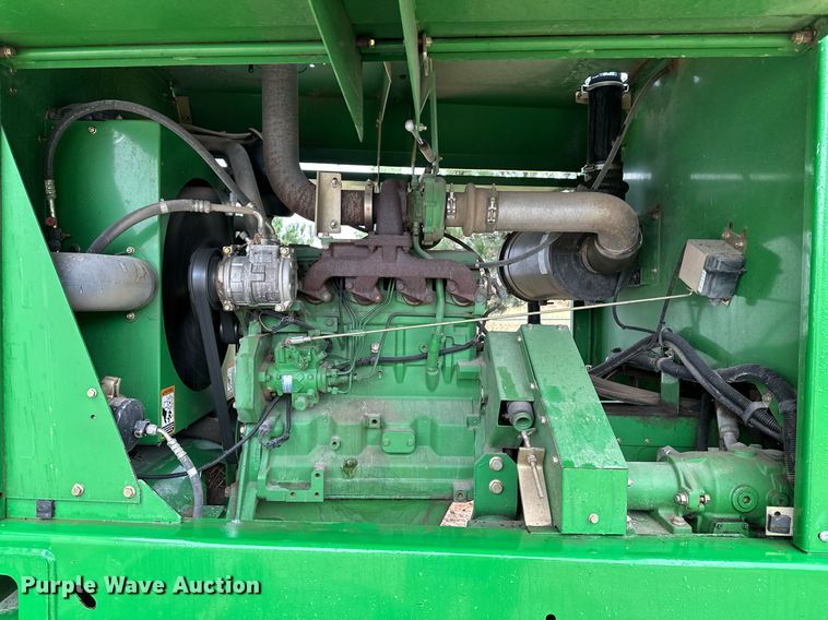 image for item NX9701 2004 John Deere 4895  swather / windrower