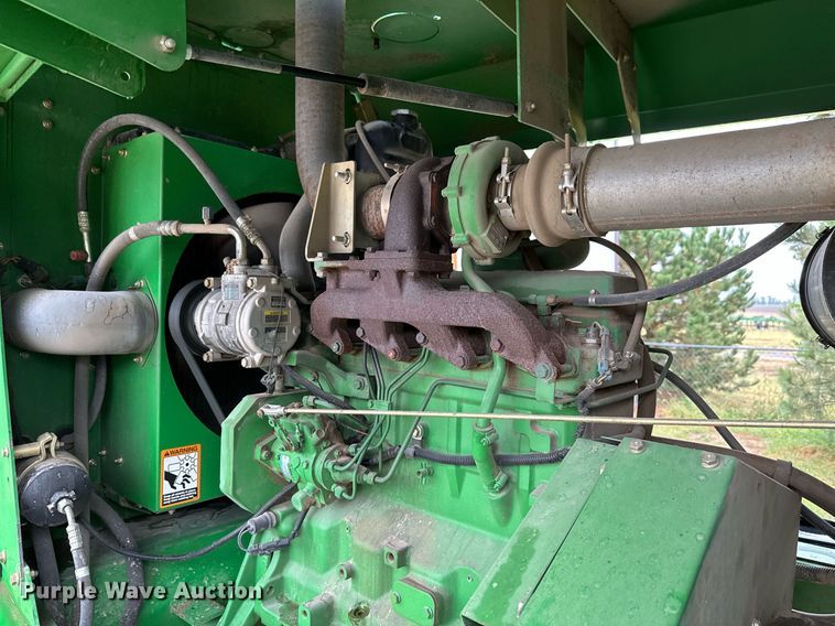 image for item NX9701 2004 John Deere 4895  swather / windrower