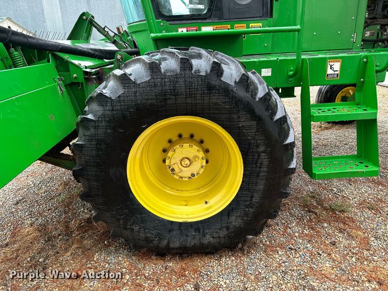 image for item NX9701 2004 John Deere 4895  swather / windrower