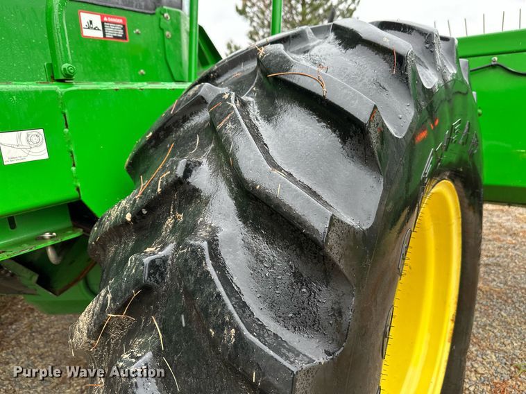 image for item NX9701 2004 John Deere 4895  swather / windrower