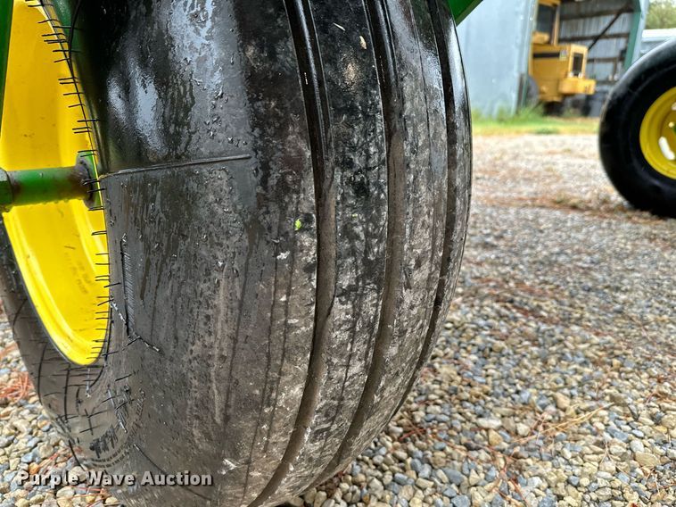 image for item NX9701 2004 John Deere 4895  swather / windrower