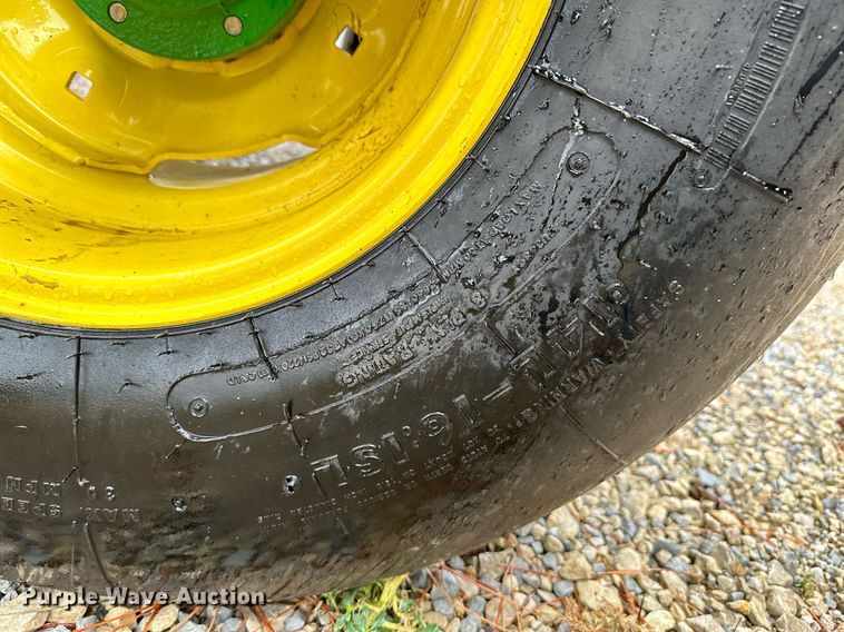 image for item NX9701 2004 John Deere 4895  swather / windrower