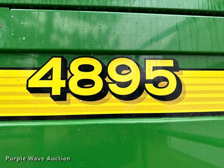 image for item NX9701 2004 John Deere 4895  swather / windrower