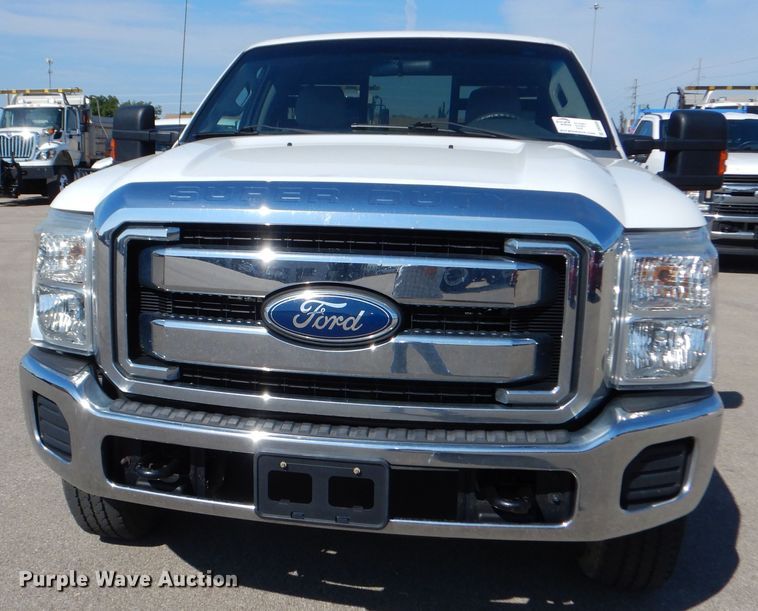 image for item DN8668 2011 Ford F250 XLT Super Duty flatbed pickup truck