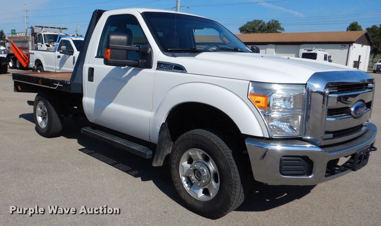 image for item DN8668 2011 Ford F250 XLT Super Duty flatbed pickup truck