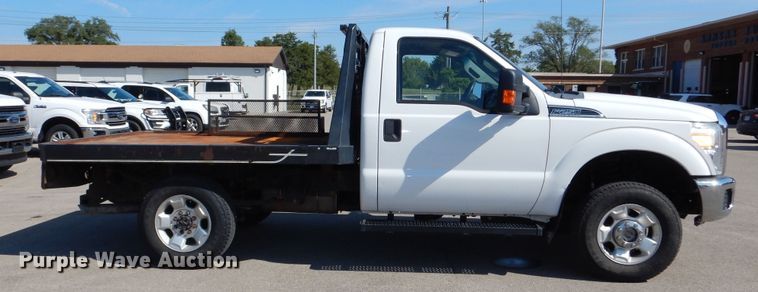 image for item DN8668 2011 Ford F250 XLT Super Duty flatbed pickup truck