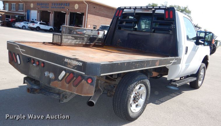 image for item DN8668 2011 Ford F250 XLT Super Duty flatbed pickup truck