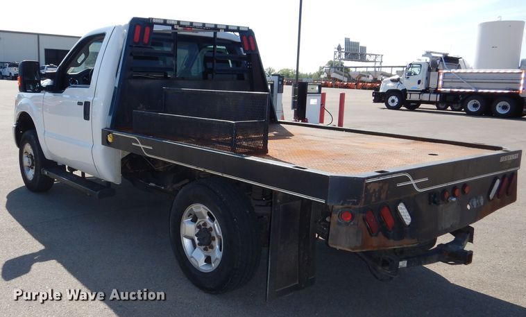 image for item DN8668 2011 Ford F250 XLT Super Duty flatbed pickup truck