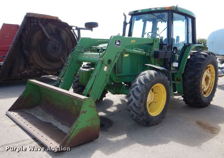 image for item DN8680 1999 John Deere 6310 MFWD tractor