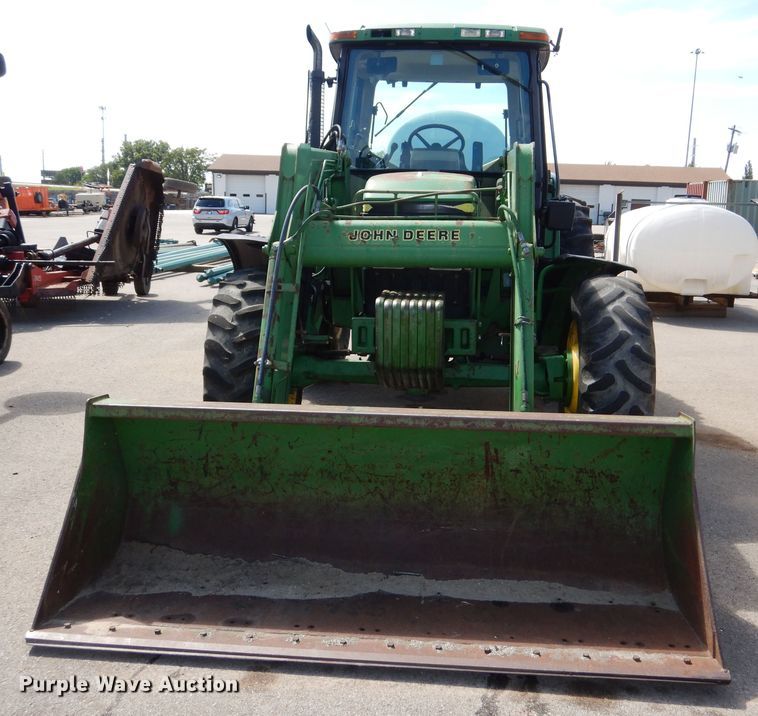 image for item DN8680 1999 John Deere 6310 MFWD tractor