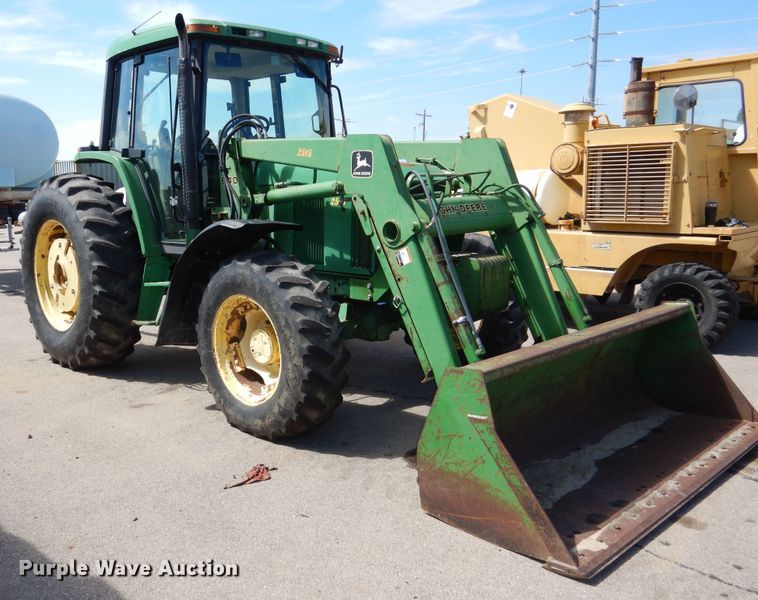 image for item DN8680 1999 John Deere 6310 MFWD tractor