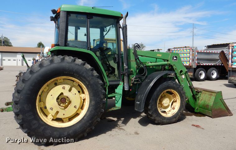 image for item DN8680 1999 John Deere 6310 MFWD tractor