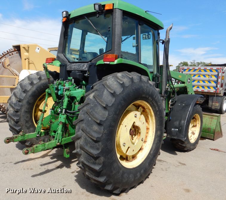 image for item DN8680 1999 John Deere 6310 MFWD tractor