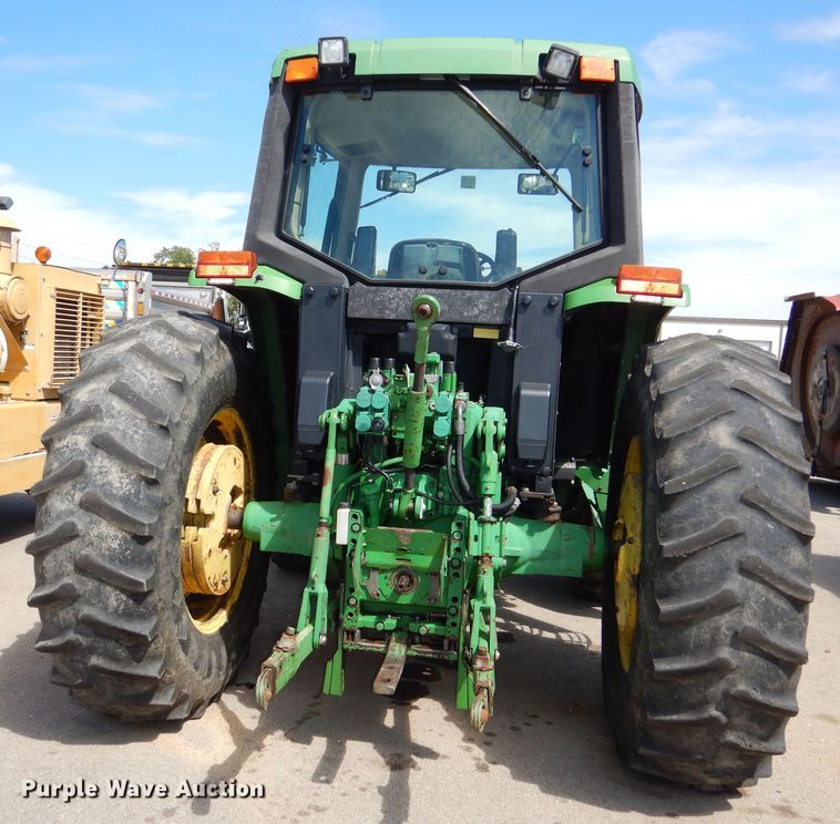 image for item DN8680 1999 John Deere 6310 MFWD tractor