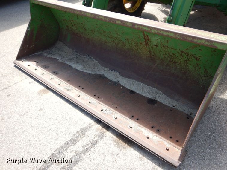 image for item DN8680 1999 John Deere 6310 MFWD tractor