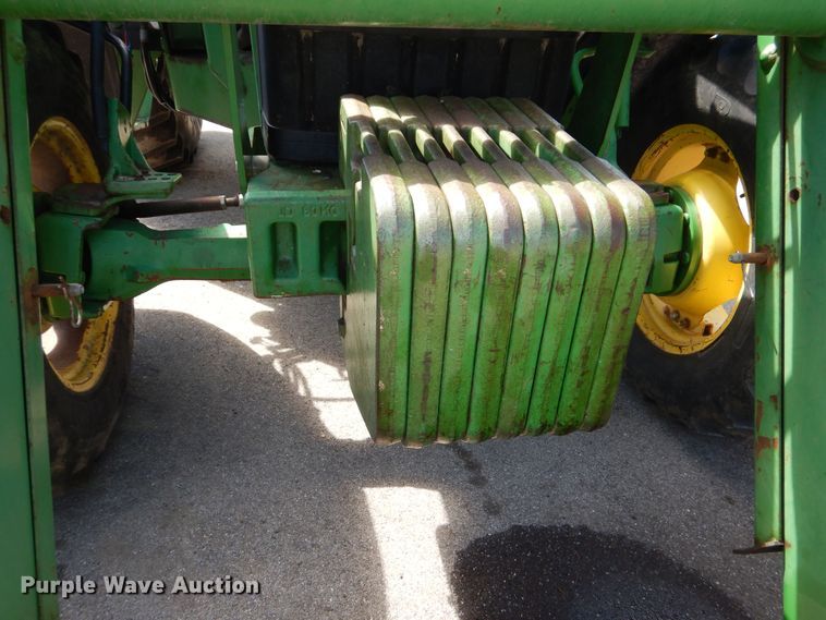 image for item DN8680 1999 John Deere 6310 MFWD tractor