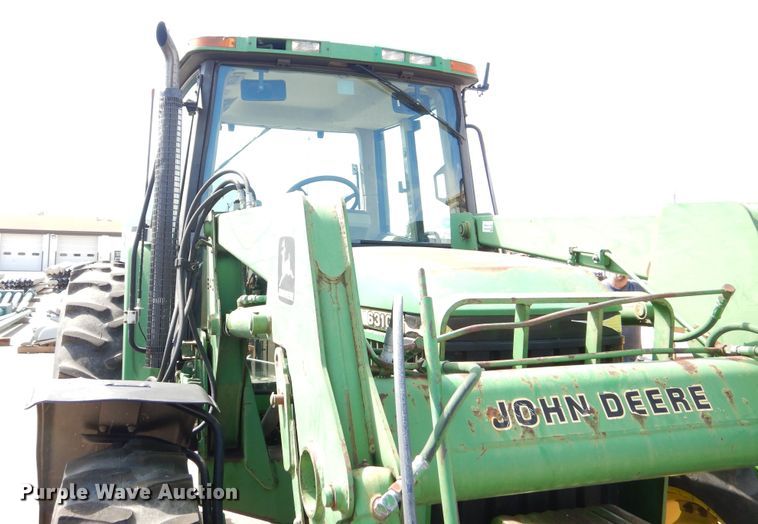 image for item DN8680 1999 John Deere 6310 MFWD tractor