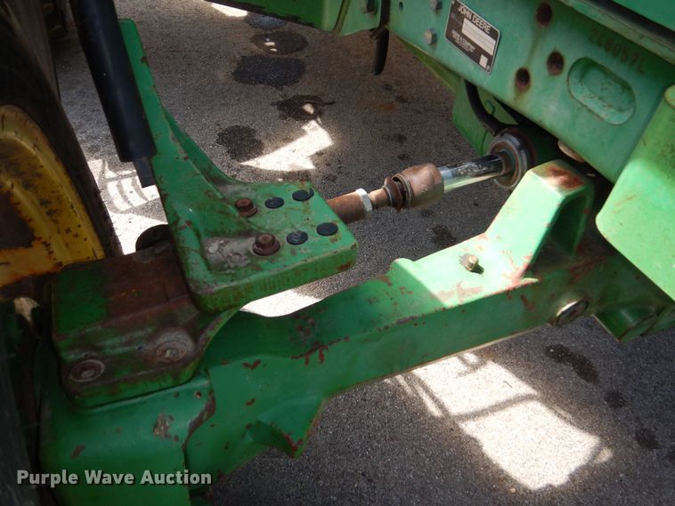 image for item DN8680 1999 John Deere 6310 MFWD tractor