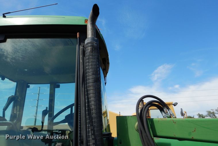 image for item DN8680 1999 John Deere 6310 MFWD tractor