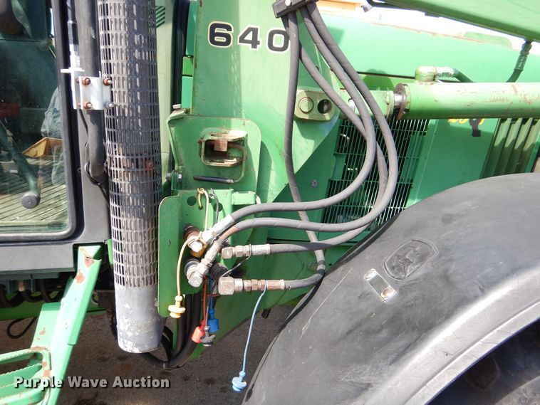 image for item DN8680 1999 John Deere 6310 MFWD tractor