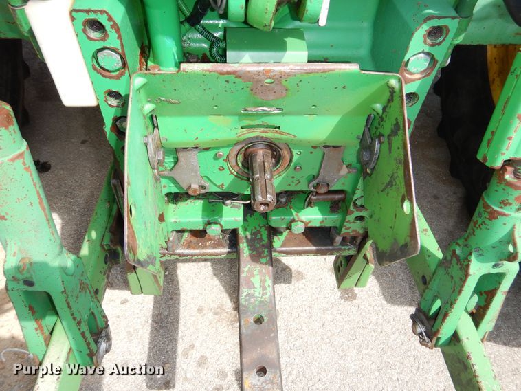 image for item DN8680 1999 John Deere 6310 MFWD tractor