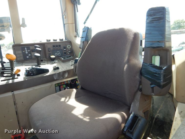 image for item DN8680 1999 John Deere 6310 MFWD tractor